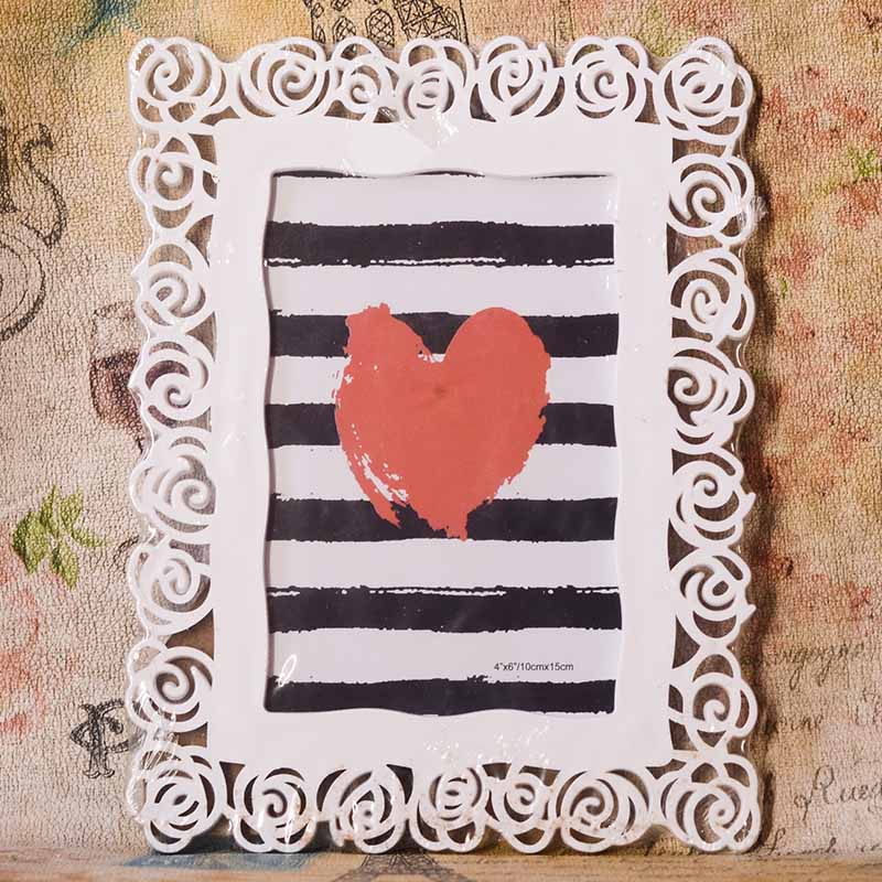 Portarretrato con borde de rosas 10x15